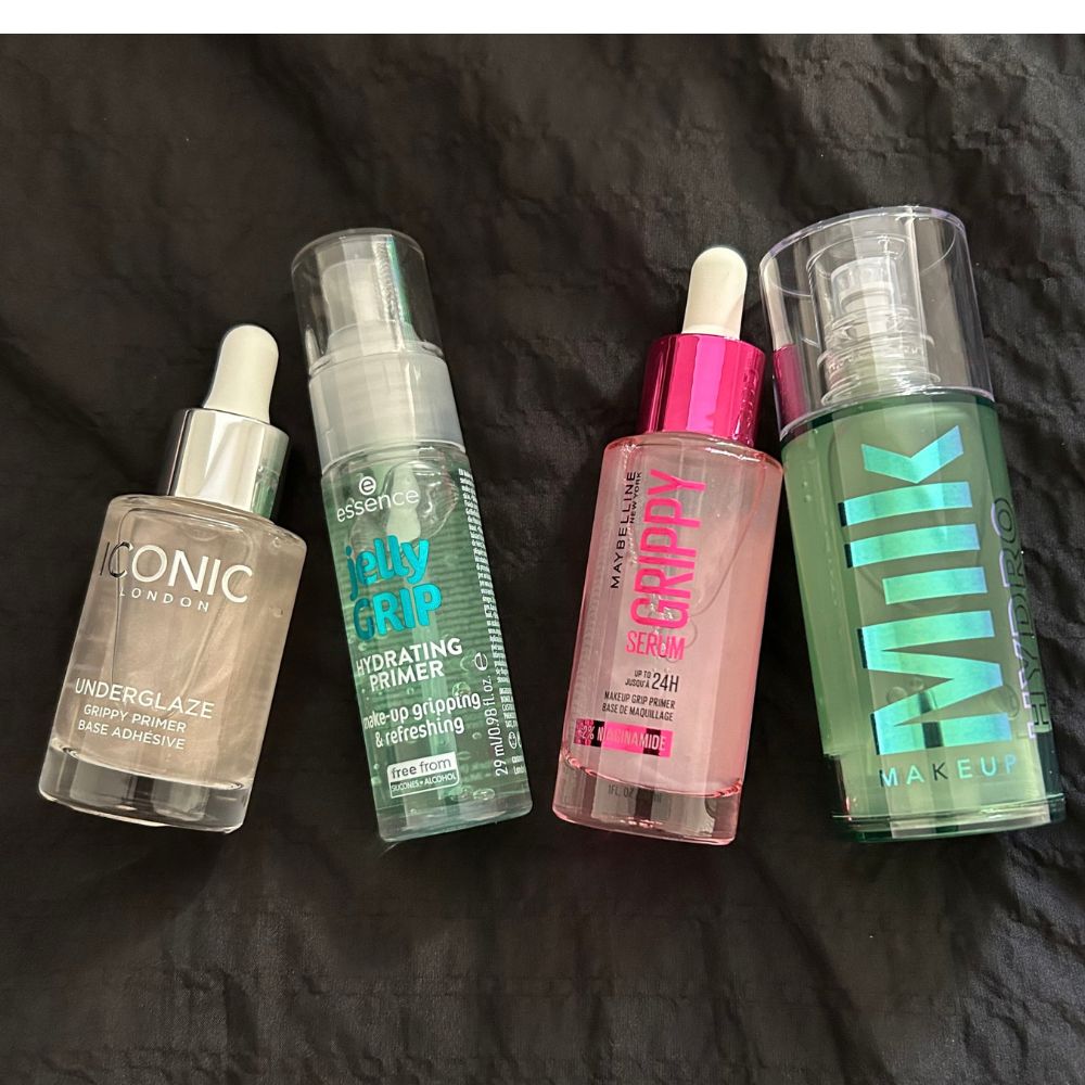 Iconic London 的 Underglaze Grippy Primer、essence 的 Jelly Grip Hydrating Primer、Maybelline 的 Grippy Serum Primer 和 Milk Makeup 的 Hydro Grip Primer 的特寫鏡頭